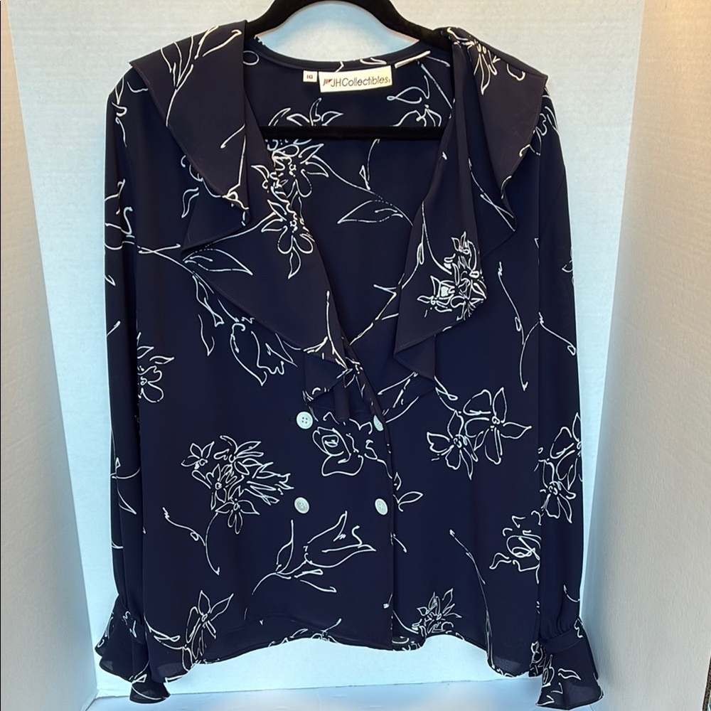 JH collectibles blouse
Size 16 women’s